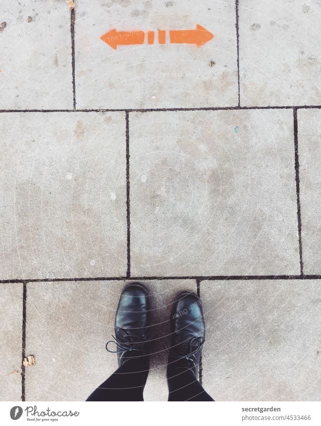 groundbreaking feet floor off walkway slabs Arrow Decide undecided Bird's-eye view Right Left Pattern interstices Footwear Bright Dark Orange Exterior shot