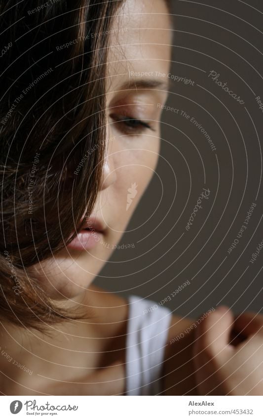 Portrait of a young brunette woman Young woman Youth (Young adults) Hair and hairstyles Eyes Lips Hand Collarbone 18 - 30 years Adults Undershirt Brunette