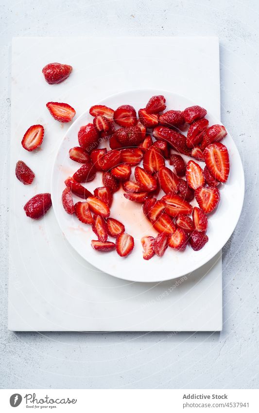 Sugar-coated sliced strawberries tasty strawberry sugar food red top view natural dessert overhead sticky snack confection fruit juicy sweet background jam