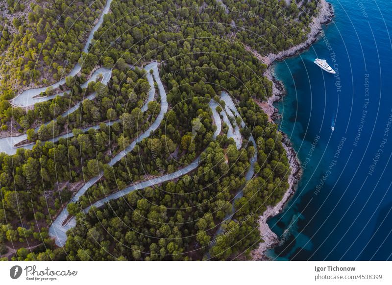 Aerial view of Luxury Sail Yacht in Assos village, Kefalonia Island, Greece drone greece beach assos sea aerial ionian kefalonia landscape blue travel idyllic