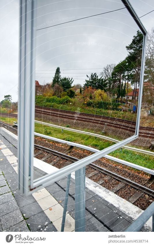 S-Bahn platform with mirror Train station Platform Commuter trains rail Rail transport Mirror Mirror image Transport public transportation PUBLIC TRANSPORT