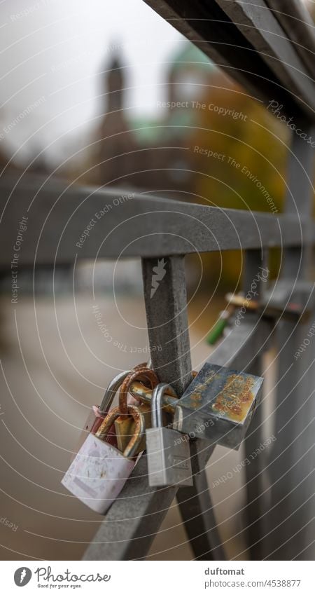 Love lock on bridges parapet Love padlock Lock Romance Together Infatuation Rust rusty Emotions Display of affection Happy Relationship Sympathy Padlock Sign