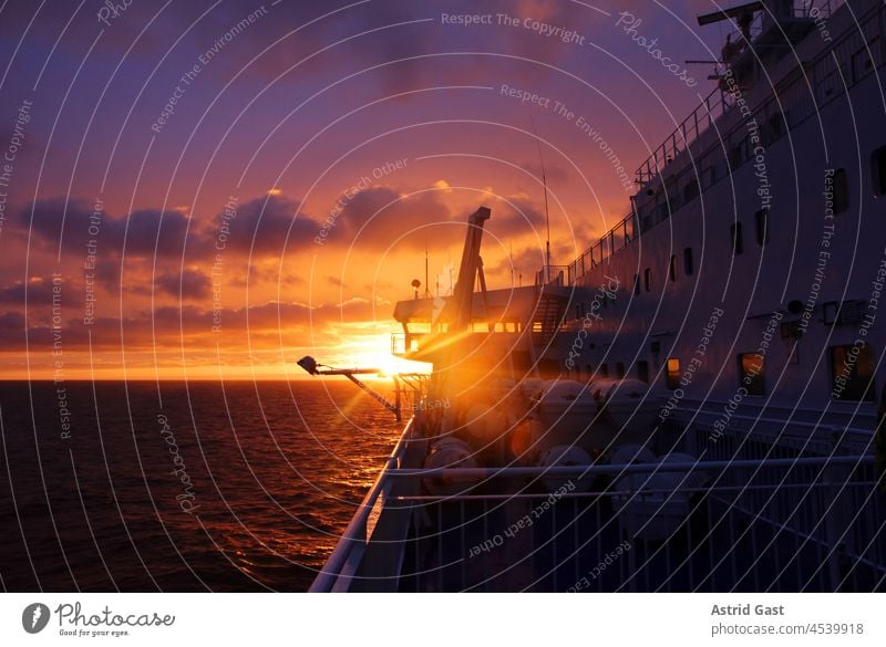 Sunset on a ferry on the North Sea Ocean Ferry ship Scotland Nature boat Sky Clouds Yellow Orange Blue Go under naturally Horizon colourful atmospheric Moody