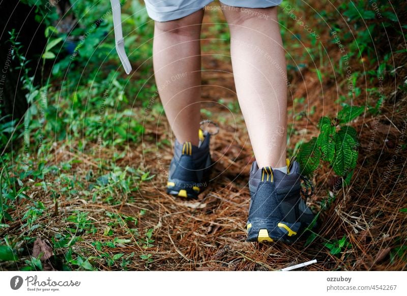 Close up female hiker shoes walking on trail person foot outdoor boot trekking sport hiking adventure leg lifestyle closeup travel active nature mountain