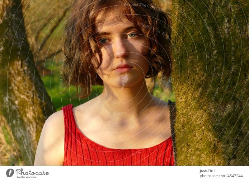 Portrait of a young woman in nature Young woman young adult Girl Feminine portrait pretty Youth (Young adults) naturally Authentic Attractive brown hair Curl