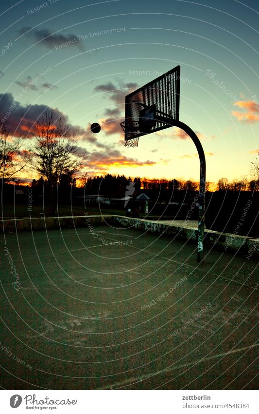 Basketball in the evening Evening altocumulus Menacing Dark Twilight somber colour spectrum Closing time Worm's-eye view cumulus cloud Autumn Sky background