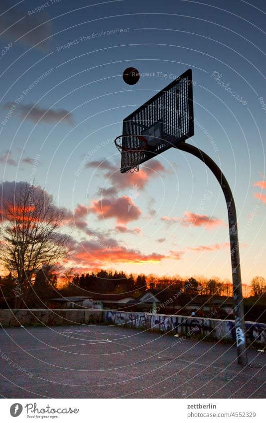 Basketball in the evening Evening altocumulus Menacing Dark Twilight somber colour spectrum Closing time Worm's-eye view cumulus cloud Autumn Sky background