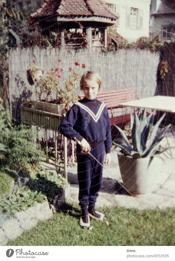 martial arts, basic course - girl with epee on the terrace of a sunny backyard portrait Girl Short-haired floret Fencing Martial arts Weapon then Stand