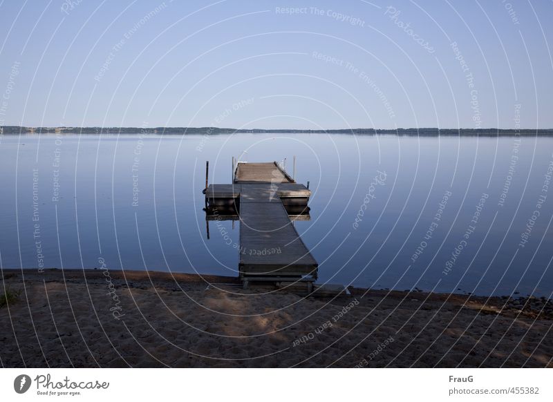 blue still Sand Cloudless sky Summer Lakeside Footbridge Wood Blue Calm Loneliness Nature Far-off places Reflection Sweden Vacation & Travel Colour photo