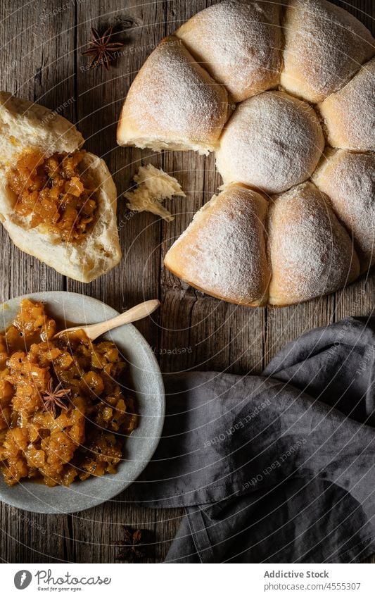 Baked bread buns with sauce in plate tasty baked delicious food appetizing yummy nutrition serve dish spoon palatable delectable fresh nutrient wooden pastry