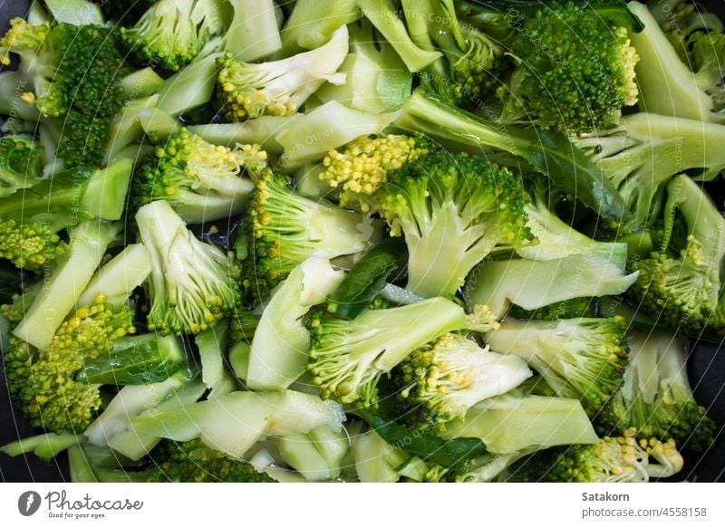 Broccoli asian background boil broccoli closeup cook cooking cuisine diet eat food gourmet green healthy ingredient meal orange oriental pan restaurant