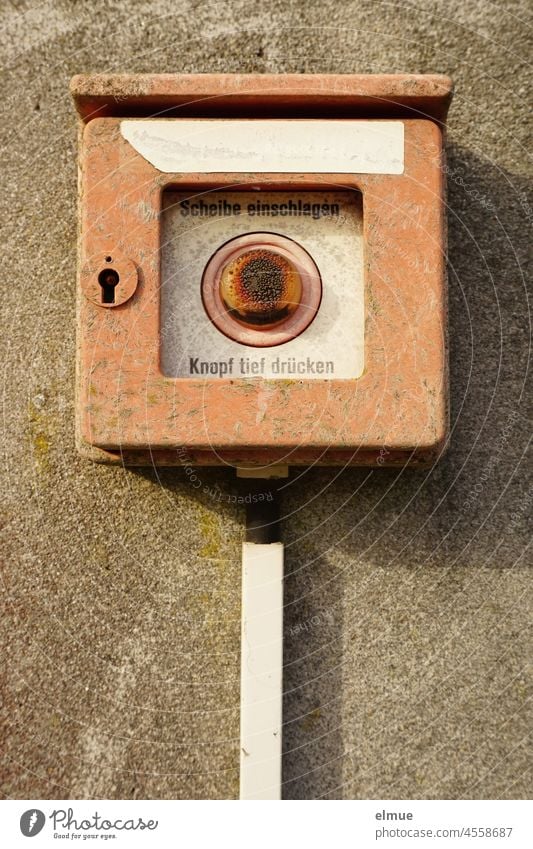 defective, rusting, historical fire alarm on a wall / fire detector / fire alarm Fire alarm fire detectors technique Historic Old Memory Broken Press button