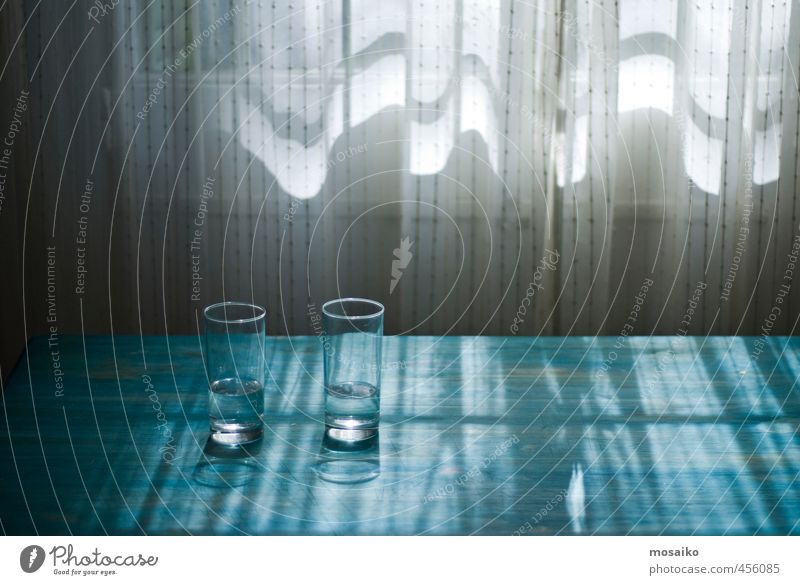 light and water - glasses on a blue table - in front of a window Diet Fasting Drinking water Glass Design Life Senses Relaxation Calm Meditation