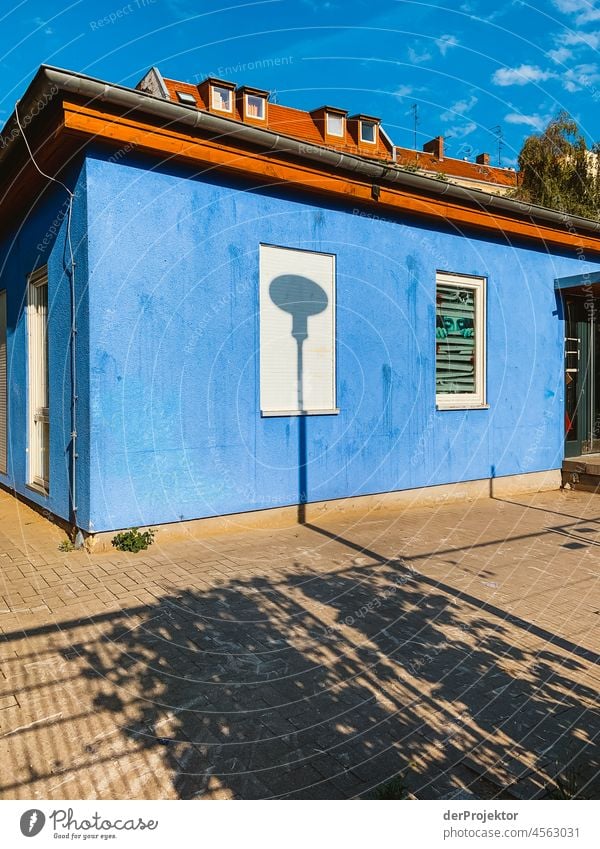 Blue house with shadow cast by lantern in Berlin Urbanization Cool (slang) Capital city Copy Space right Copy Space left Copy Space middle Copy Space bottom