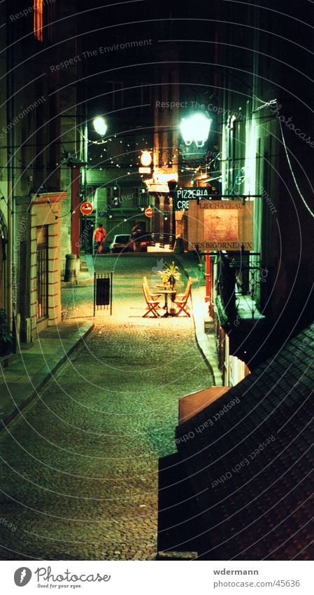 Deserted alleyway in St. Malo, France Town Night Alley Chair Restaurant Europe lane chairs