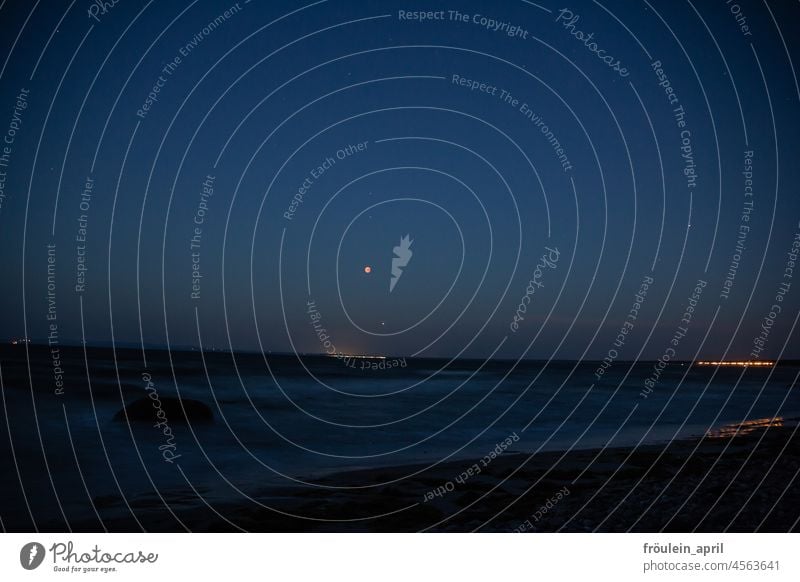 Blood moon at the sea with Mars blood moon long-term recording Ocean Moon Lunar eclipse Night Baltic Sea Rügen Beach Water Waves Sky Nature Full  moon Night sky