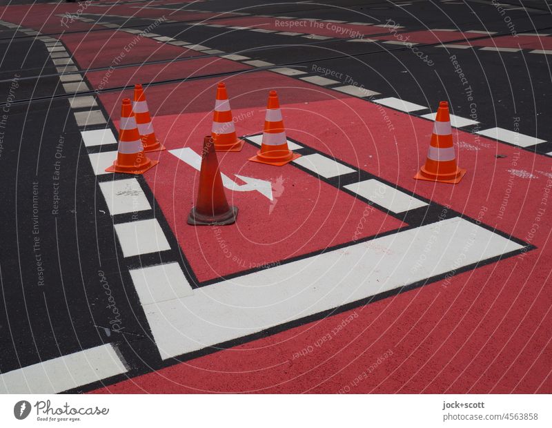 New cycle lane for turning left by bike Cycle path Street Lane markings Arrow Asphalt Turn off Renewal Traffic cone Direction Traffic infrastructure