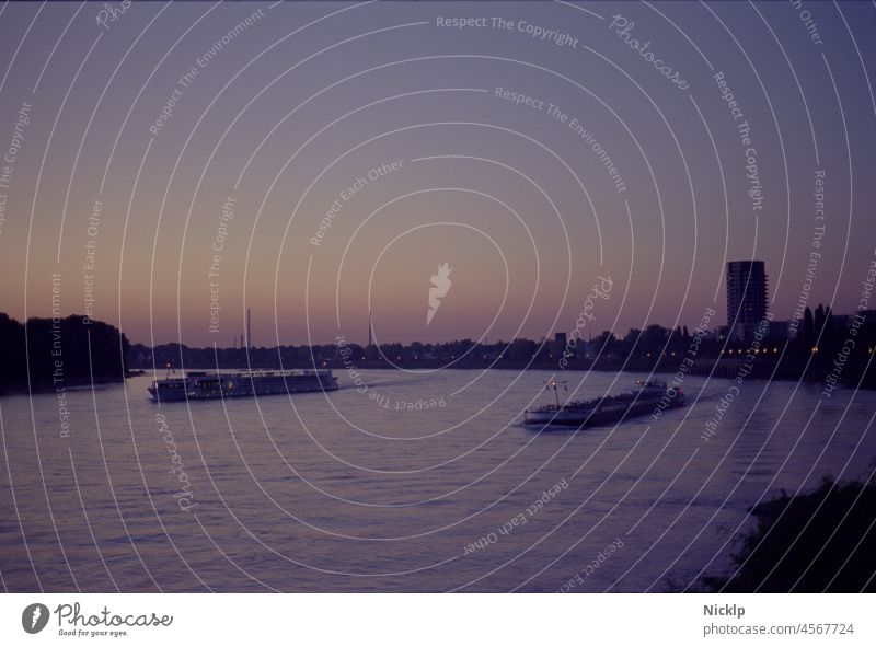 two cargo ships on the Rhine in the dusk near Cologne, Mülheim / Stammheim Sunset River Cargo-ship Navigation Twilight Mood lighting Dusk Evening