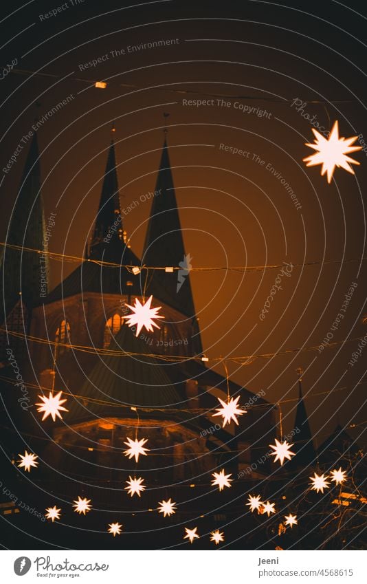 steeple and many christmas stars Church Church spire Religion and faith Sky House of worship Tower Tourist Attraction Historic Old Landmark Lübeck Christmas