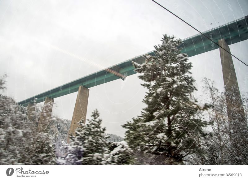 from below... Bridge pass road motorway bridge European bridge Bridge pier vertiginously Tall bridging Winter down through Valley Crossing Highway alpine pass