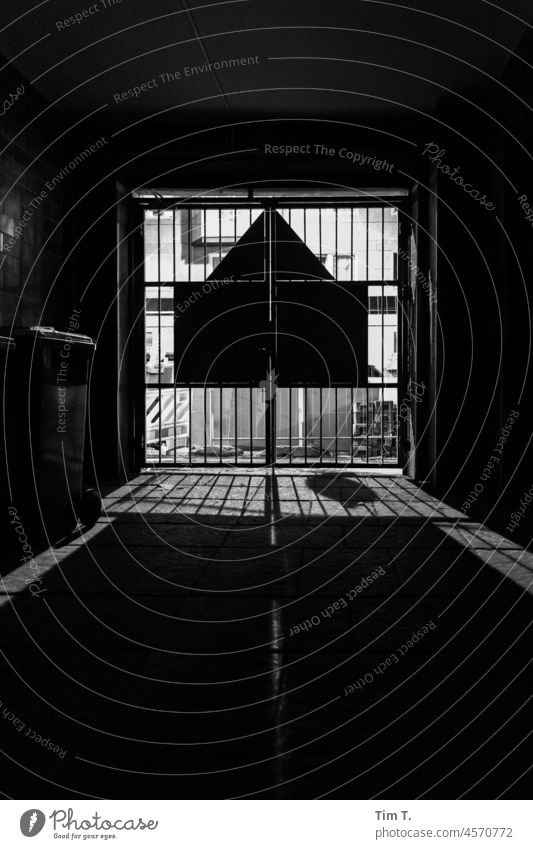 Gate entrance at night with shadow Berlin Middle Night b/w Entrance Way out Goal passage Town Downtown Exterior shot Deserted Capital city Architecture