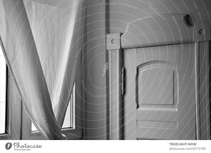 Daylight falls through the kitchen window onto the pantry door in a Berlin Art Nouveau apartment dining room Kitchen Detail view Window daylight Drape Doorframe