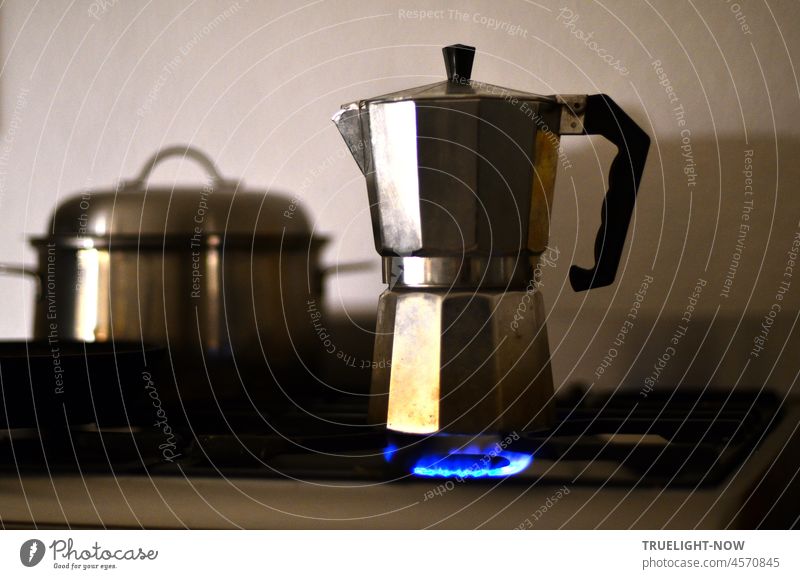 Many know this / Water hisses, coffee smells / There'll be espresso soon! Espresso Espresso pot Italian Gas stove Gas flame Kitchen Kitchen stove Blue