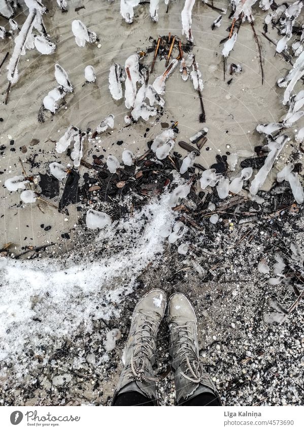 Standing at beach in winter Beach Sand Beach dune Vacation & Travel Ocean Coast Baltic Sea coast Tourism Baltic coast Baltic beach Landscape Nature Ice Boots