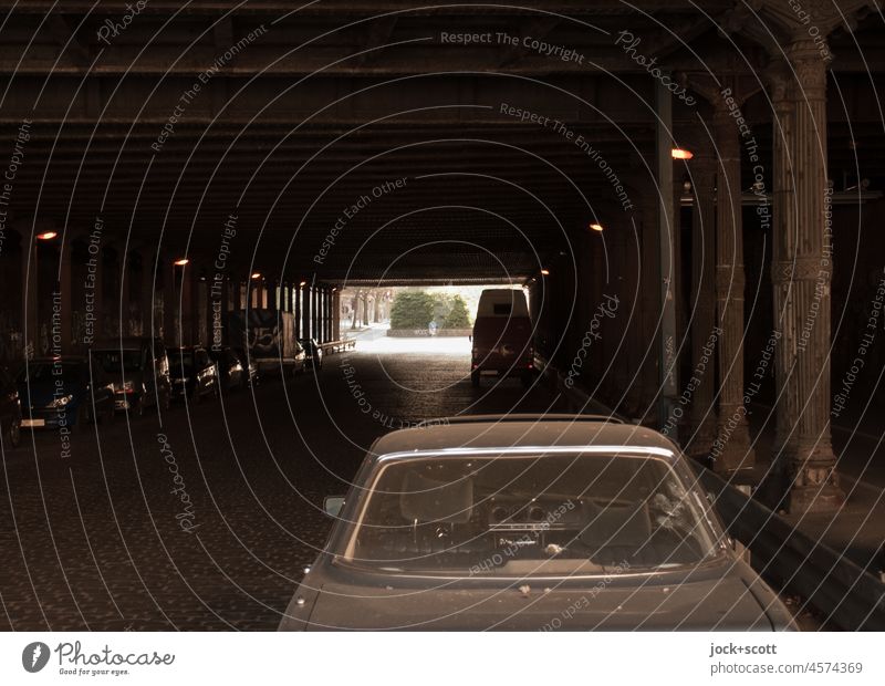 a vintage car parks in the dim light Gleimtunnel Prenzlauer Berg Berlin Parking Dark Shaft of light Tunnel Street Nostalgia Column Shadow Retro Car Design