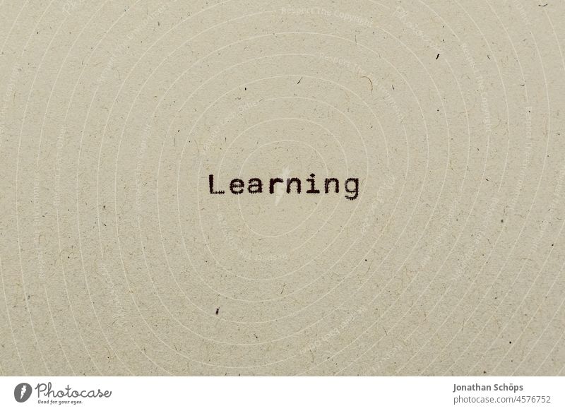 Learning as text on paper with typewriter corona corona crisis coronavirus covid-19 bottom line learning learning effect Paper Recycling Typewriter writing