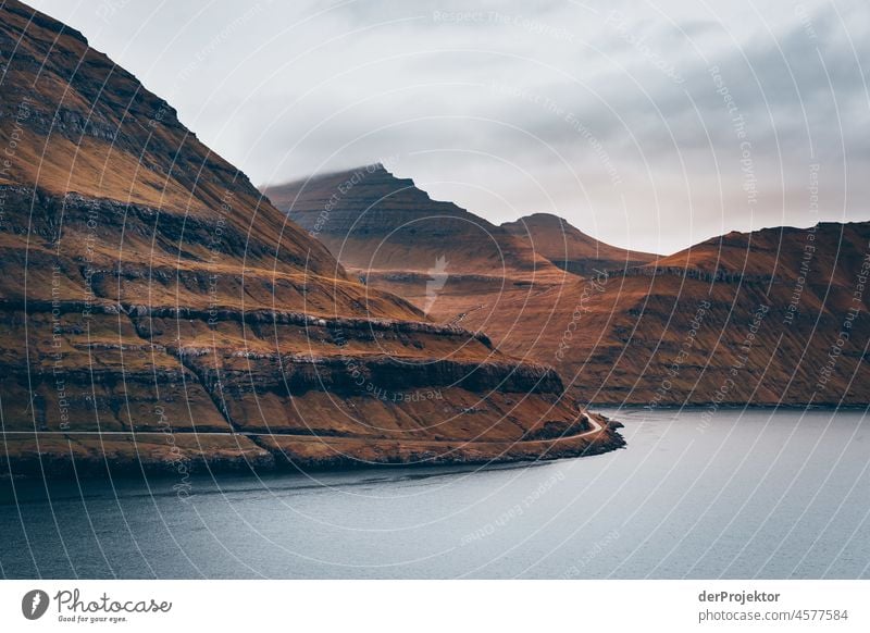 Faroe Islands: View of Eysturoy island with road II Territory Slope curt Dismissive cold season Denmark Experiencing nature Adventure Majestic Curiosity