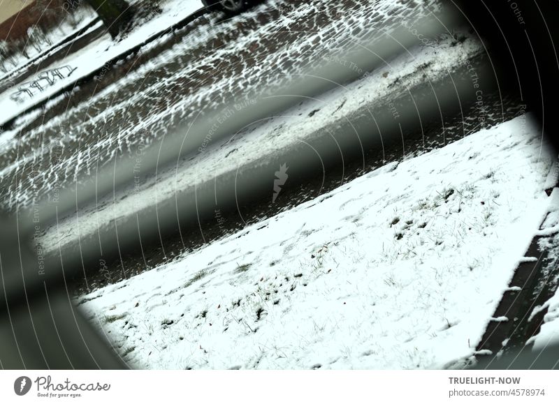 Straight the track / First snow has fallen / View out of the window Winter town Side road first snow Snow paving Wagon Tracks Skid marks Diagonal diagonal