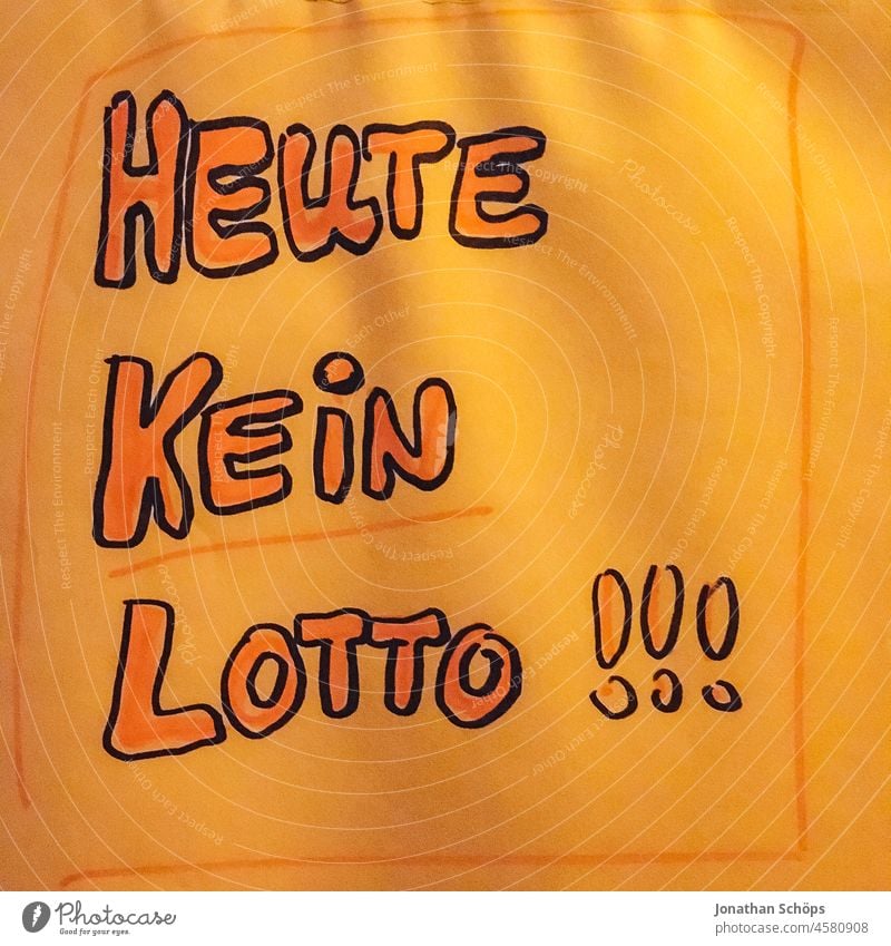 Today no lotto as writing on slip of paper Save Pressure to save Compulsive gambling authored orange colour Orange Exclamation mark ! !!! Piece of paper today