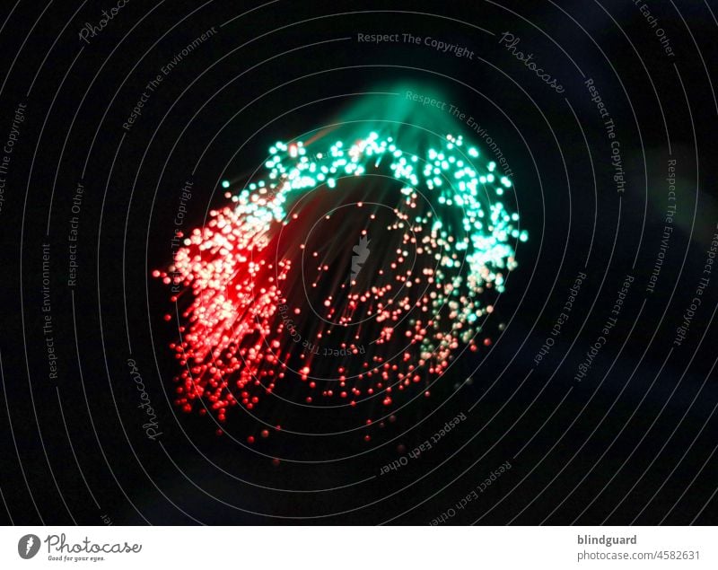 Red, green and white dots on black Light bokeh Play of colours points lines Green White Black Emotions color change blurriness background hazy Decoration