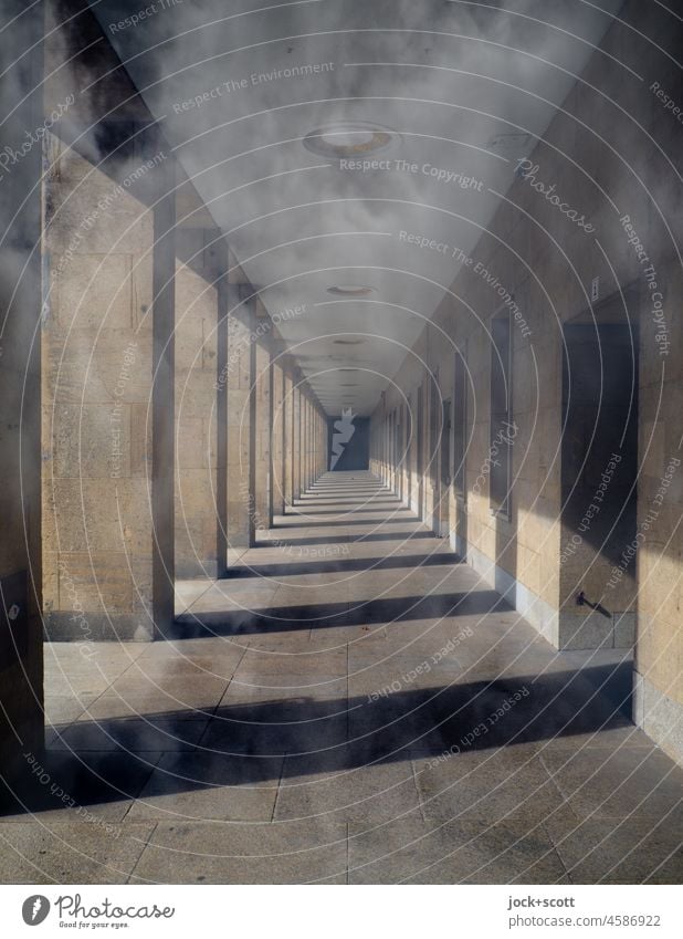 Clouds meet light and shadow Architecture Structures and shapes Historic Long Sunlight Symmetry Silhouette Airport Berlin-Tempelhof Abstract Shadow play