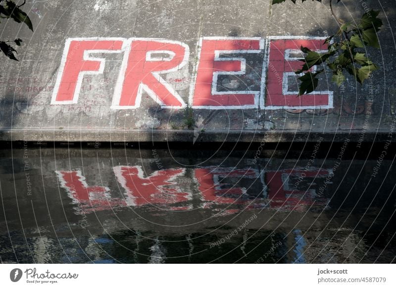 feel free Street art Word English Free Capital letter Silhouette Reflection Spirited Bank reinforcement Berlin Typography Neukölln Treptow Neutral Background