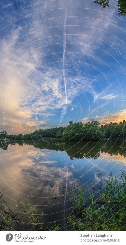 Peaceful scene from lovely small lake near Frankfurt in twillight germany Hesse rhine main area Moerfelden Walldorf Moerfelden-Walldorf recreation area