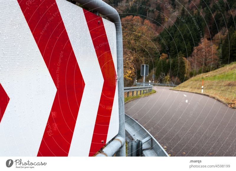 Curvaceous route Countdown marker Street Road traffic curvaceous Curve Landscape Autumn Safety Road sign Signs and labeling Warning sign Motoring StVO