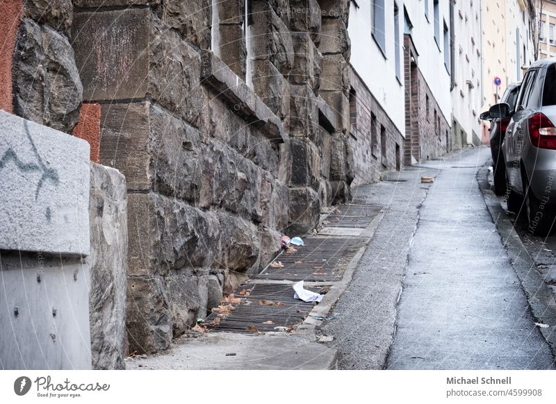 Running uphill in the city go uphill upstairs strive for the top Street cars Sidewalk Residential area Apartment Building Town City