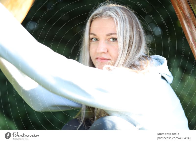 Blonde woman Woman Long-haired Athletic Sports Climbing Playground free time Break Park astonished kind Smiling Human being Leisure and hobbies Happy Joy