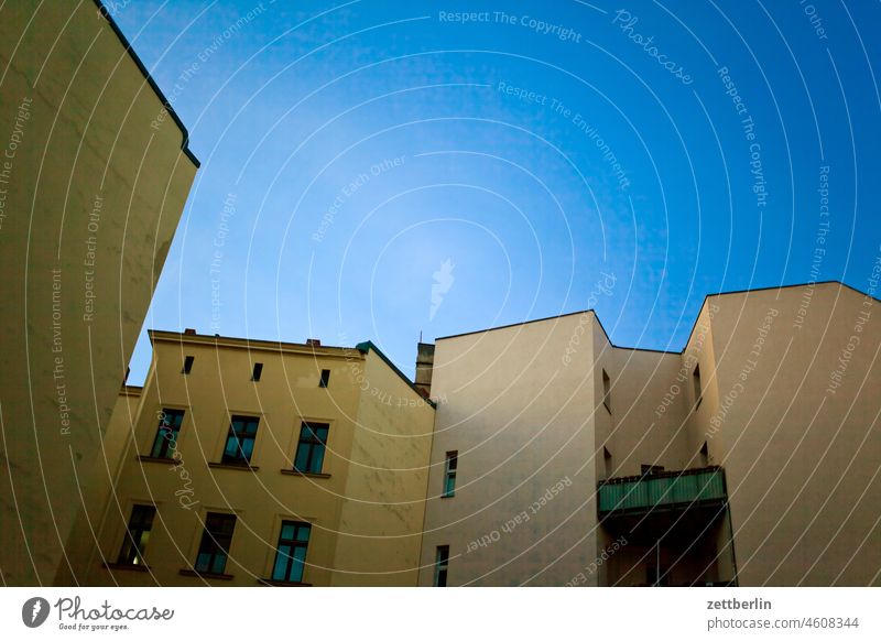 Backyard in Schöneberg slight return Old building on the outside Fire wall Facade Window House (Residential Structure) Sky Sky blue rear building Courtyard