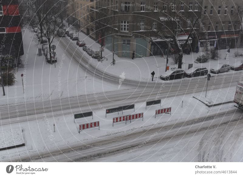 Snowy white dark day | under a veil of gray | lies frozen the city Town cross Exterior shot Street Lanes & trails Traffic infrastructure Winter Day 1 Person