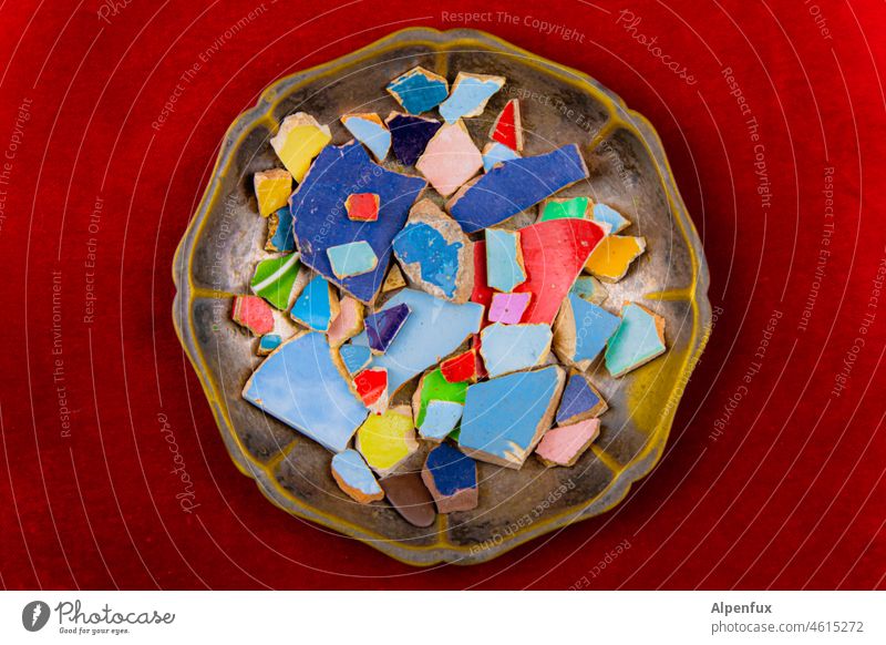 A cauldron of colours tiles shards variegated Broken Tile bowl Colour photo Shard Red Splinter Old Deserted Destruction colourful Play of colours Bright colours