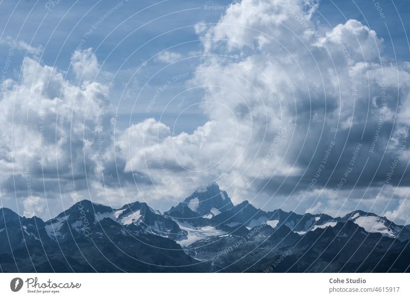 View of the Matterhorn Alps Switzerland Mountain Italy Zermatt Glacier Blue sky Clouds mountains Mountaineering Snow travel Nature Landscape Nature photo