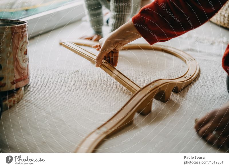 Mother and child playing with wooden train track motherhood Child childhood Playing Track Train Family & Relations Parents Joy Lifestyle Infancy people care