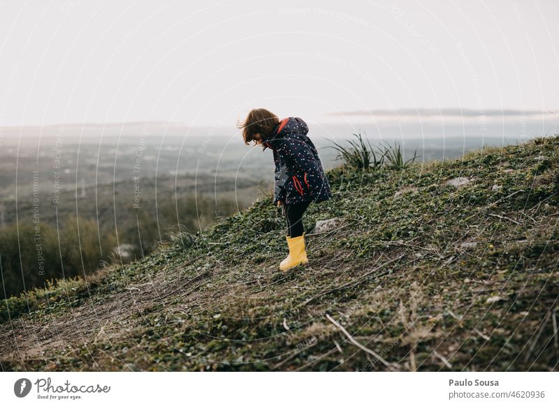 Side view of girl with Yellow rubber boots side view Girl 3 - 8 years Caucasian Rubber boots Winter Autumn Human being Authentic Leisure and hobbies Day Joy