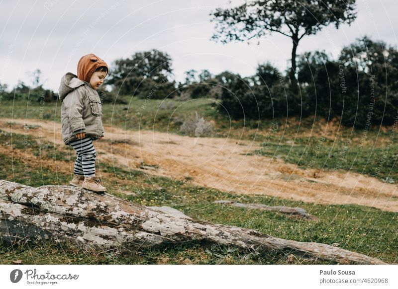 Child climbing a small rock childhood Adventure explore 1 - 3 years Caucasian one Exterior shot Infancy Leisure and hobbies Joy Cute Lifestyle Authentic