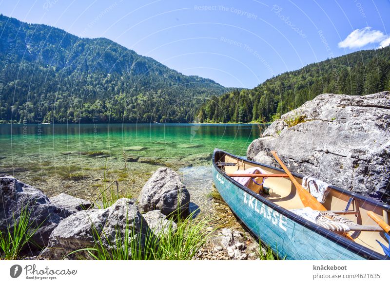 eibsee with canoe Eib Lake Landscape Alps Nature Mountain Lakeside Calm Vacation & Travel Summer Canoe Canoe trip