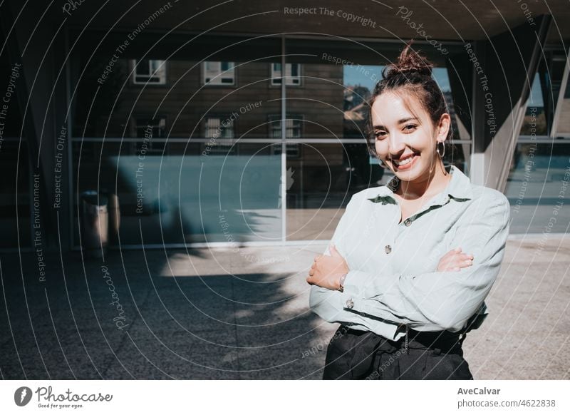 Young arab businesswoman portrait happy at his new job opportunity, professional job interview preparation outfit and attitude ready concept. Copy space for text and image. Office job works.