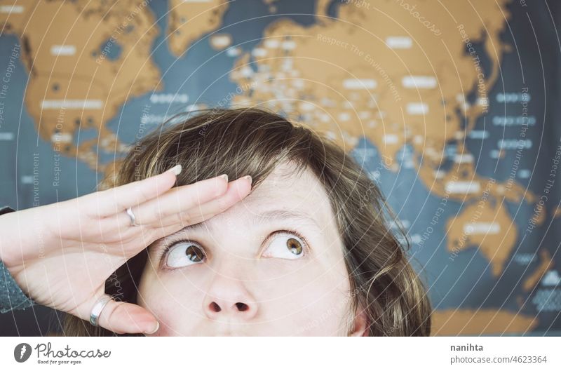 Wanderlust concept image of a woman near a world map wanderlust explore trip travel hope dream dreaming day dreamer traveler women young girl destiny curious